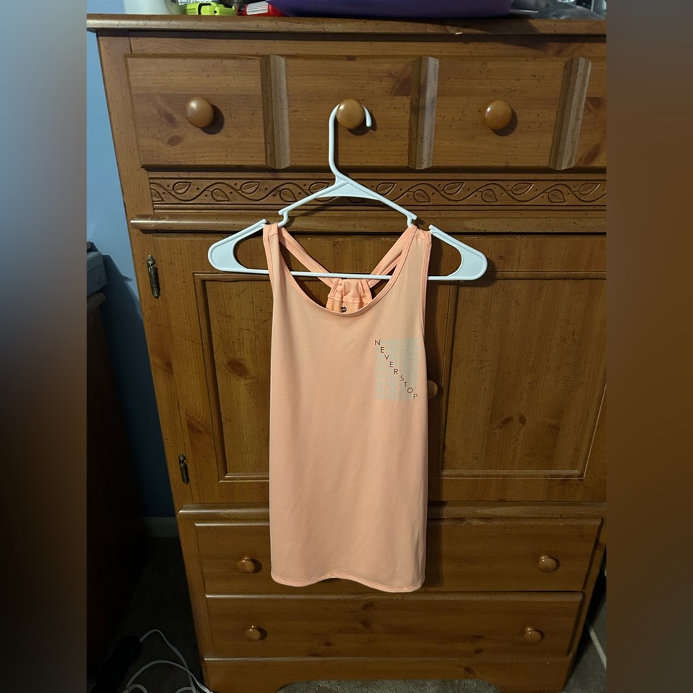 Orange athletic tank top. New without tags